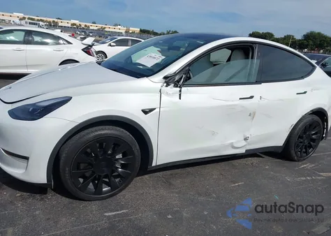 2023 Tesla Model Y из США, поврежденный, VIN 7SAYGAEE9PF792088